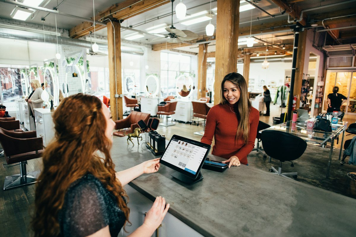 Customer using smartphone digital wallet for instant 1-click Apple Pay and Google Pay checkout without typing billing fields